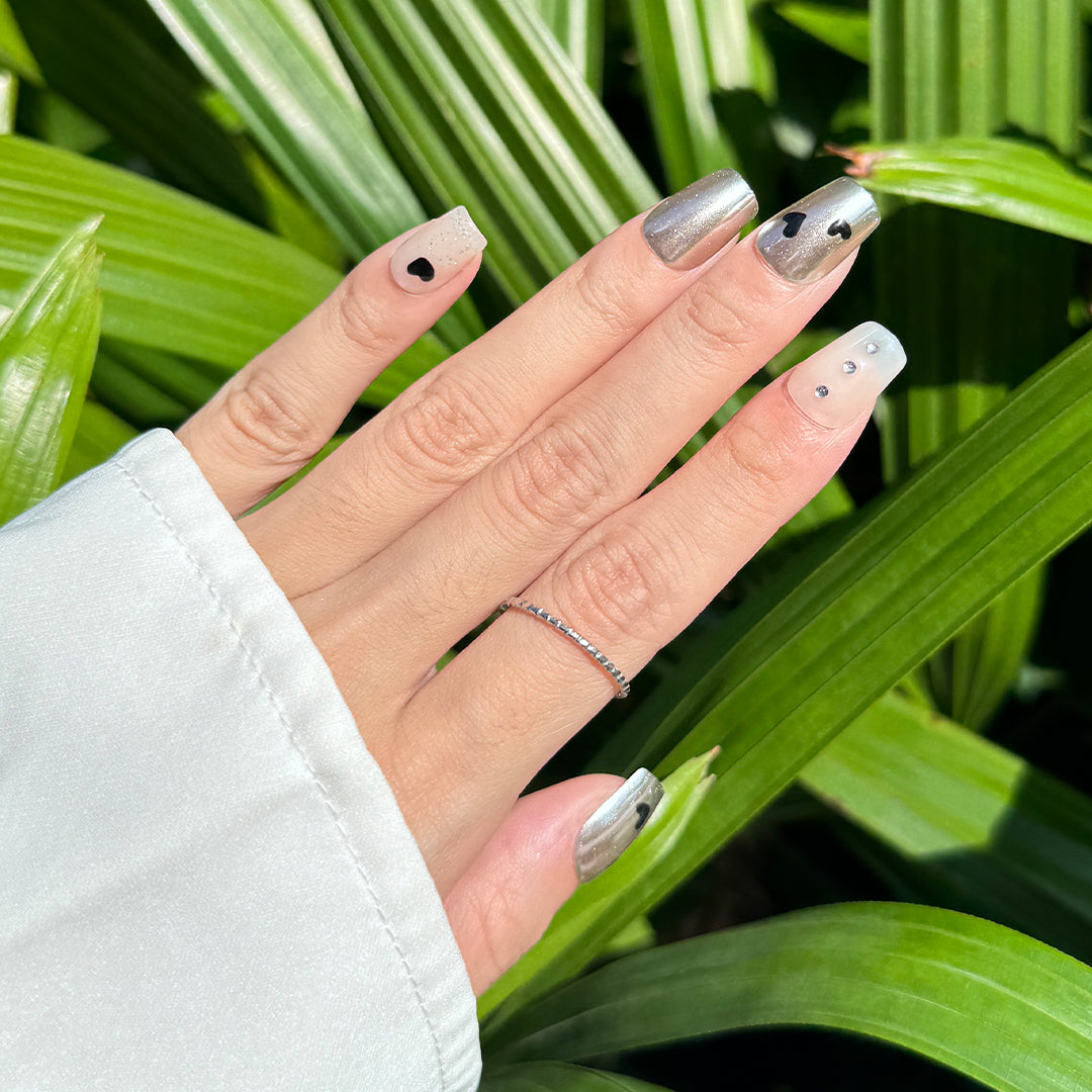 Heart Armor handmade short square metallic silver press-on nails with black heart accents