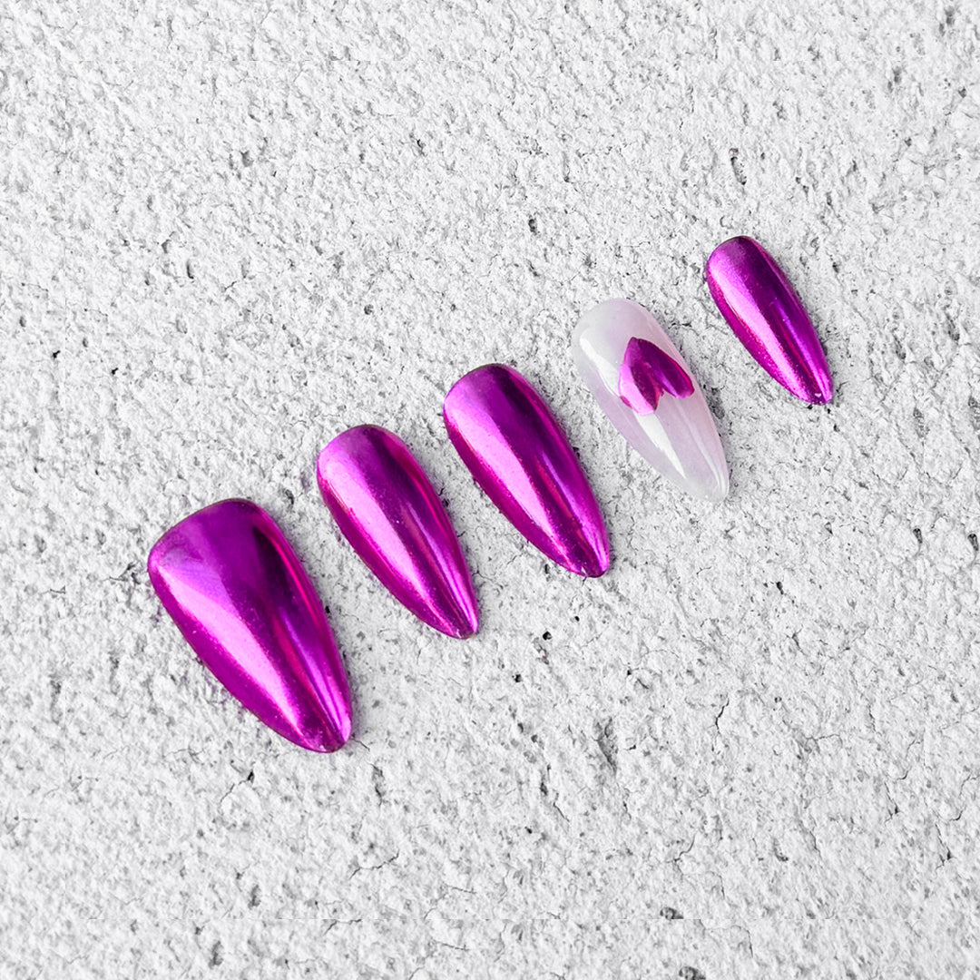 Handmade almond-shaped press-on nails in metallic rose red with milky white accents and a bold heart design. Daring, sexy, and fiery style.