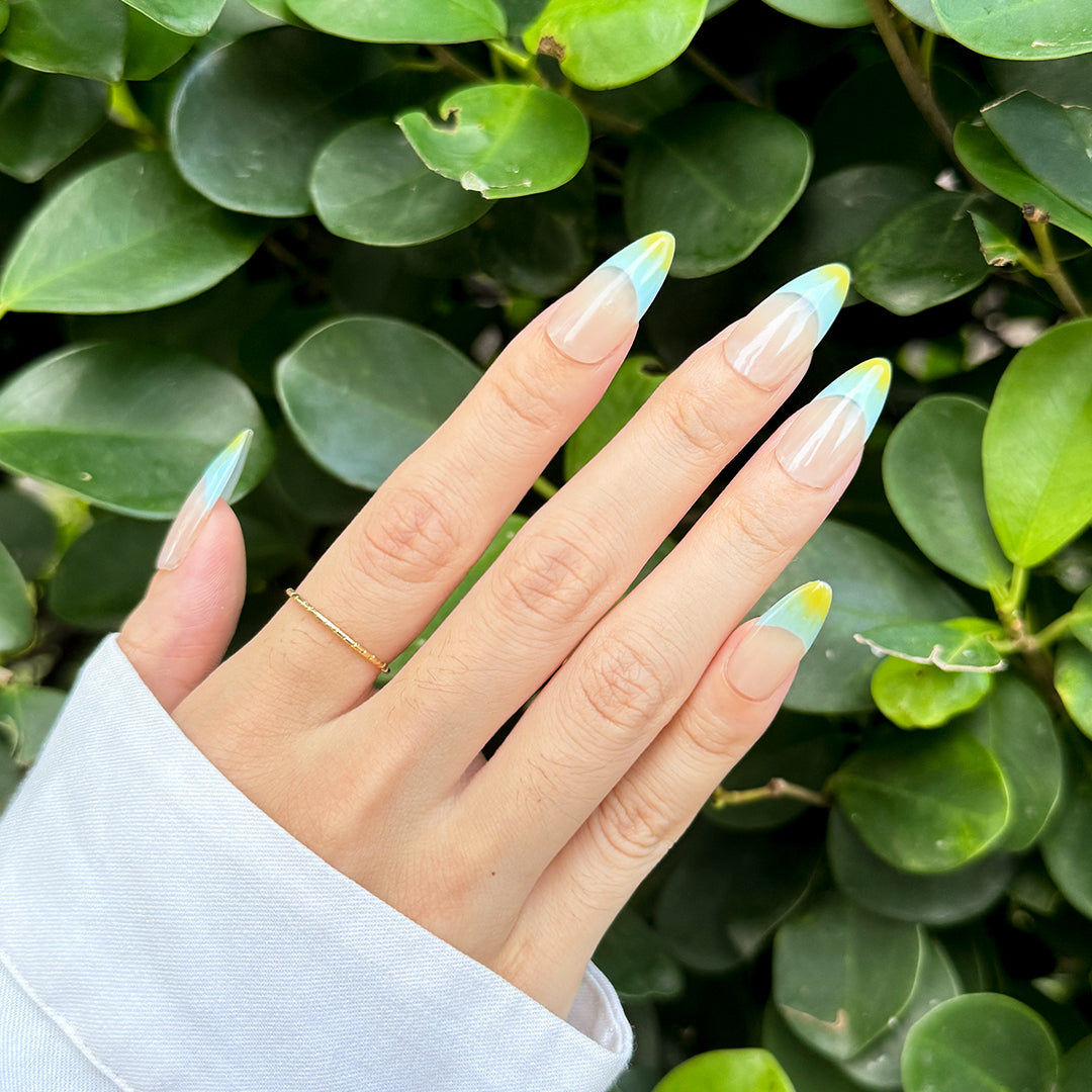 Fincloset almond-shaped sheer French press-on nails with mint green to yellow gradient tips, fresh and minimalist design.