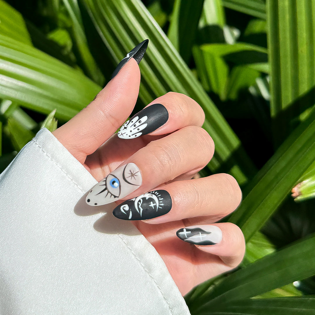 Eye of the Demons handmade matte almond-shaped press-on nails with dark, edgy demon eye design